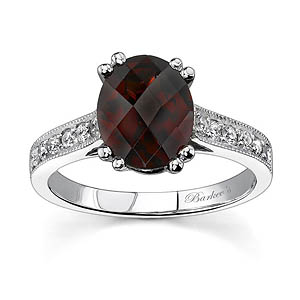 White gold diamond and red garnet ring