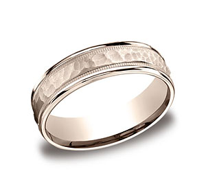 This 6mm comfort-fit carved design band features a hammered-finished center with a milgrain pattern along the high polished edge for a stylish look.