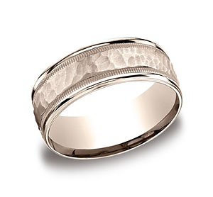 This 8mm comfort-fit carved design band features a hammered-finished center with a milgrain pattern along the high polished edge for a stylish look.