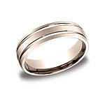 This incredible 6mm comfort-fit carved design band features a satin-finished with two high polished paralle...
