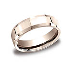 This stylish 6mm comfort-fit high polished carved design band features a slight beveled edge for a classic ...