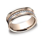 This stylish 7.5mm comfort-fit concave pave set channel diamond band features a satin-finished center with...