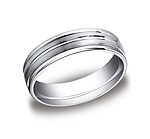 This incredible Platinum 6mm comfort-fit satin-finished carved design band features a high polished round e...