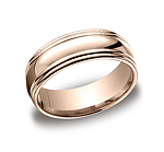 This unique 7.5mm comfort-fit high polished carved design band features a high polished double round edge...
