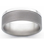 8MM FLAT TITANIUM BAND WITH(1).5MM OFF CENTER GROOVE. THE LARGE EDGE IS...